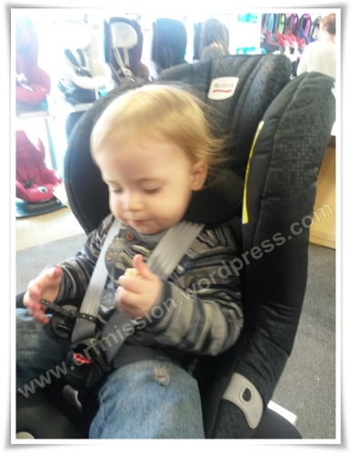 Britax Max Way is a rear facing car seat. Headrest is pulled to the top, making the straps go far above the child's shoulders.